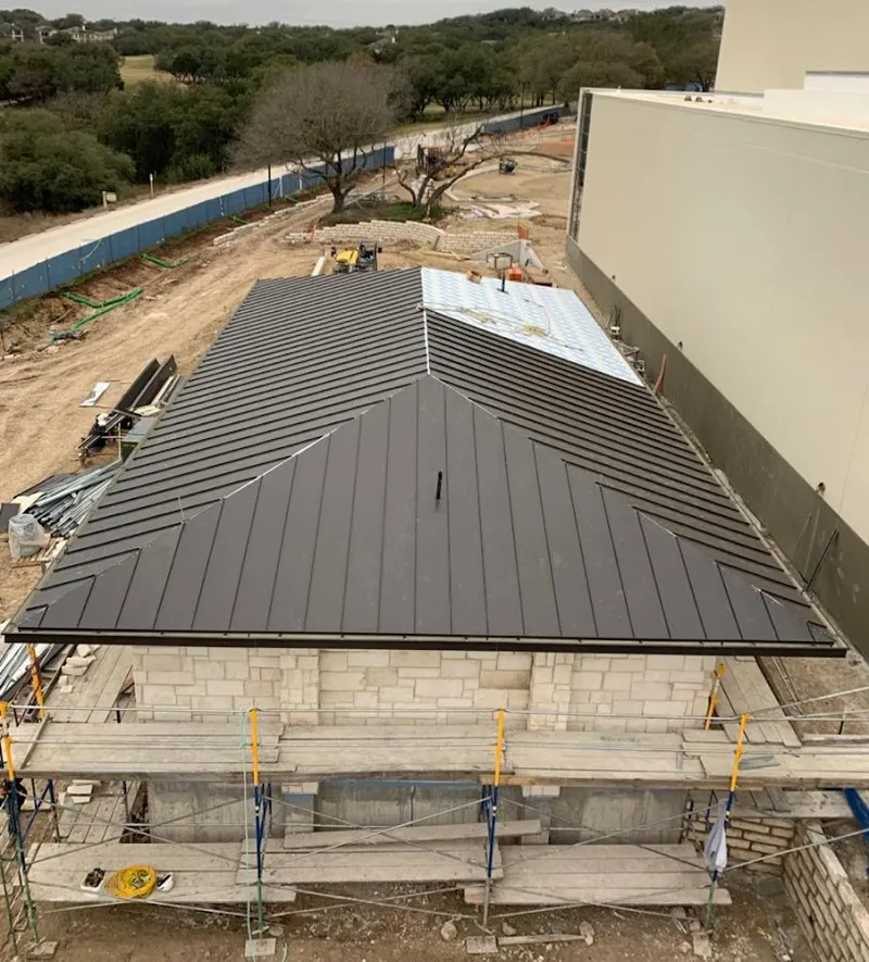 Metal roof new construction with scaffolding in Timonium